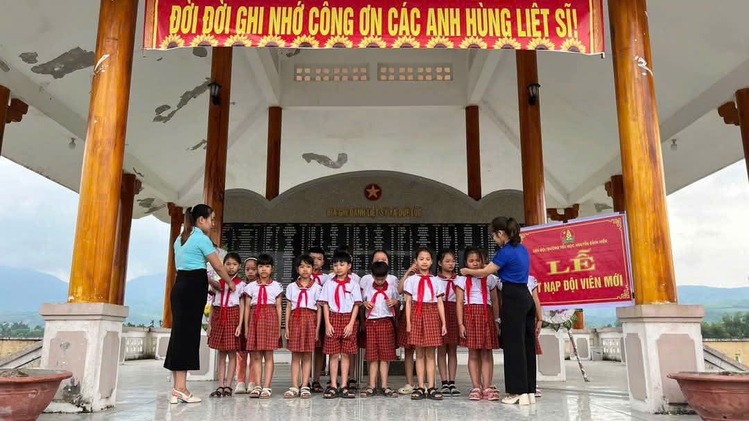 A group of children in school uniforms
Description automatically generated