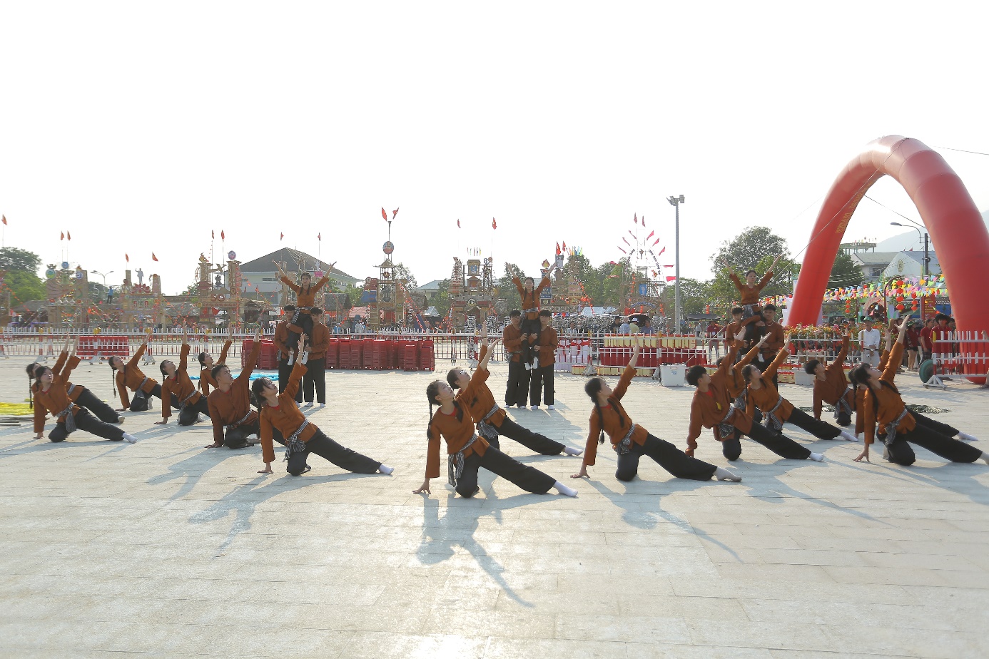 A group of people performing martial arts Description automatically generated