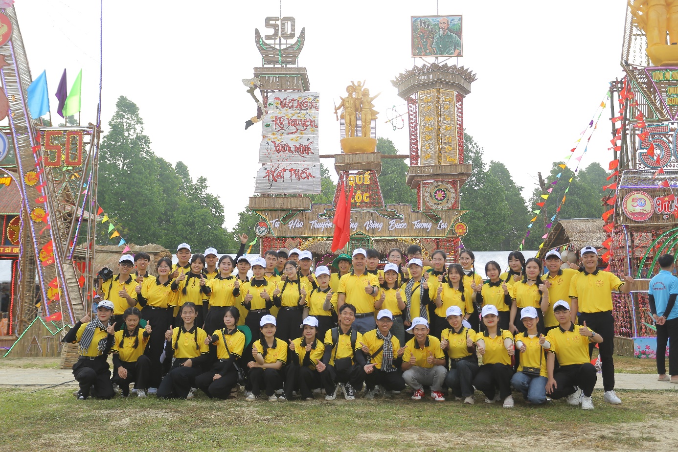 A group of people posing for a photo Description automatically generated