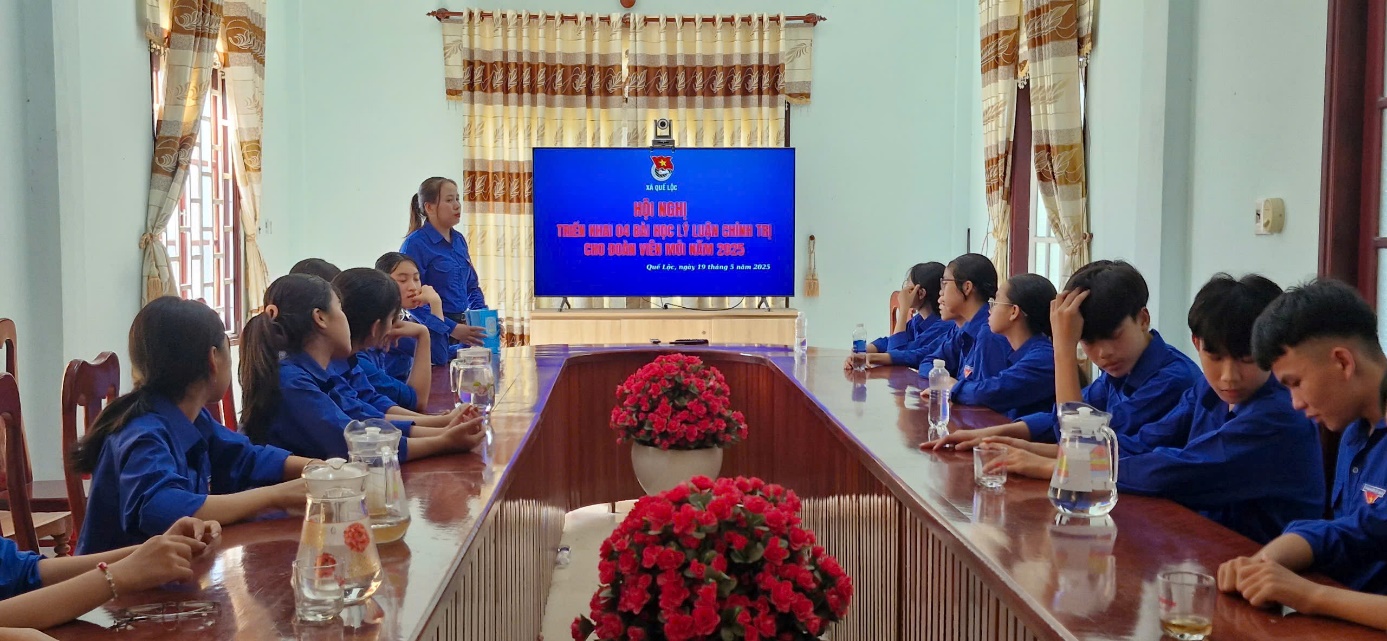 A group of people sitting at a table

Description automatically generated